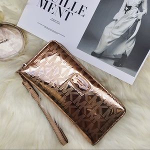 Michael Kors ◉  Metallic Rose Gold Wallet
